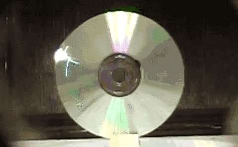 Animated gif: A CD fragmenting in a microwave