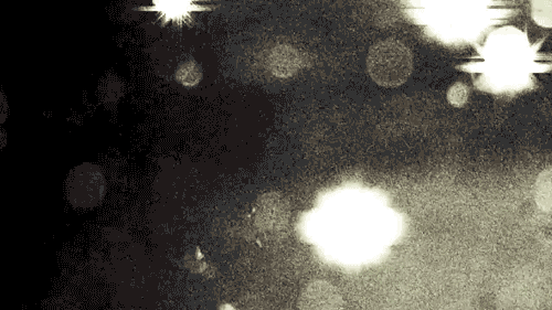 black and white animated gif of sparkling lights